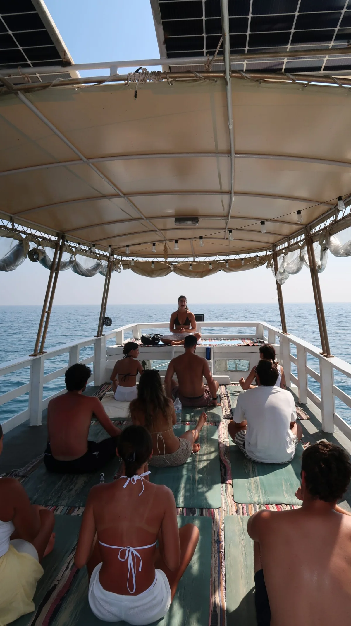 A yoga practice on the deck of the Blue Chitta boat